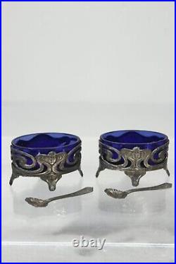 Salerons & cuillères Art Nouveau verre bleu cobalt & métal décor visages 1900s